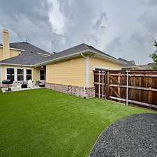 Backyard-Redesign-with-Artificial-Turf-Putting-Green-Landscape-Rock-Installation-in-McKinney-TX 7
